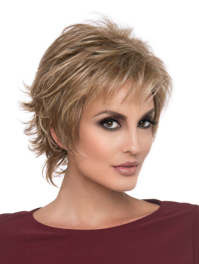 headshot of model wearing golden chin length wig