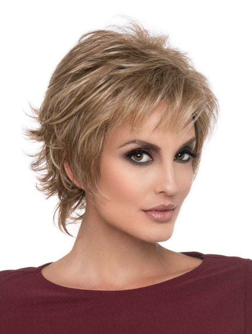 headshot of model wearing golden chin length wig