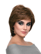 headshot of model wearing brown chin length wig