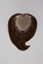 Top Notch hair topper flat lay