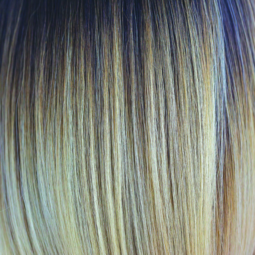 Blonde Ambition  -  This fashionable blond is a must have for the on trend customer who loves ombre and root stretched colors.Â Starting from a chocolate root then stretching into a butterscotch blond and finally melting into cream, gold and champagne blonds. Blonde Ambition is one of our high heat colors.