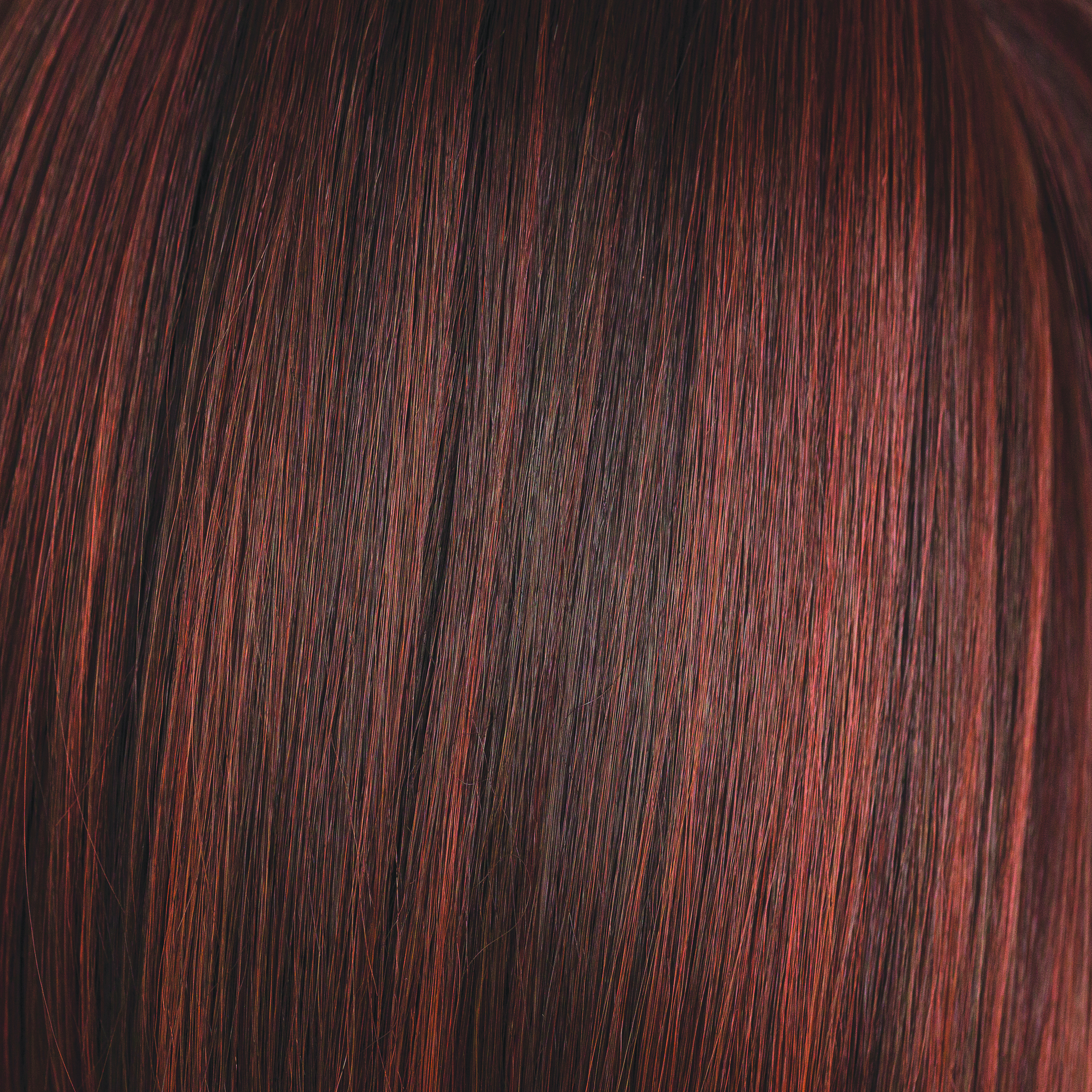 Burnt Chili  -  This sassy, spicy red is irresistible with a slight depth to the root flowing into rusty red and cherry color.Â Burnt Chili gives off many different red tones and red lights.Â  This coppery concoction is flawless and is one of our high heat colors.