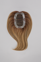 easiPart Medium HD 12" blonde hair topper flat lay