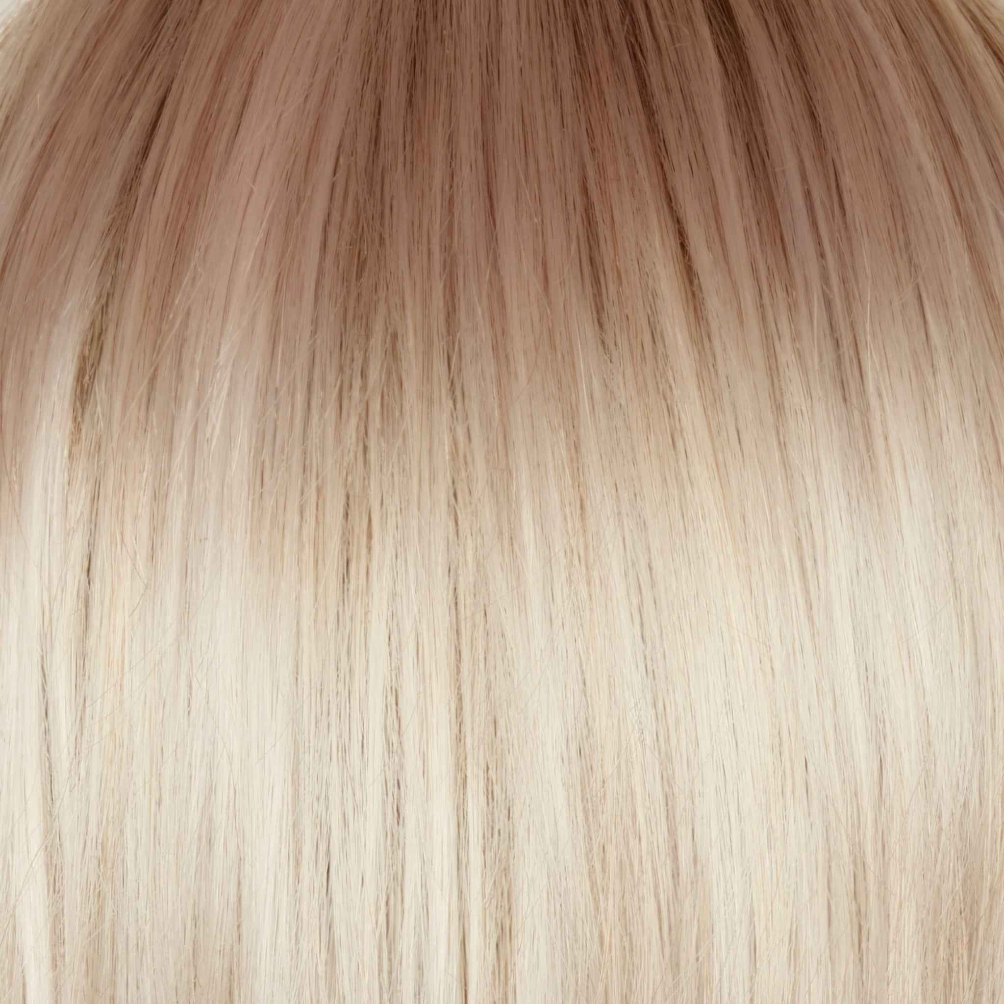 Ghost Blond-R - The rooted sister of the stunning hair colorÂ  â€˜Ghost Blondâ€™. This color has a medium neutral blond rootÂ  regrowth which transfers intoÂ  a pearl cream blond . The unique platinum blond undertones give this color a distinctive and eye-catching appearance