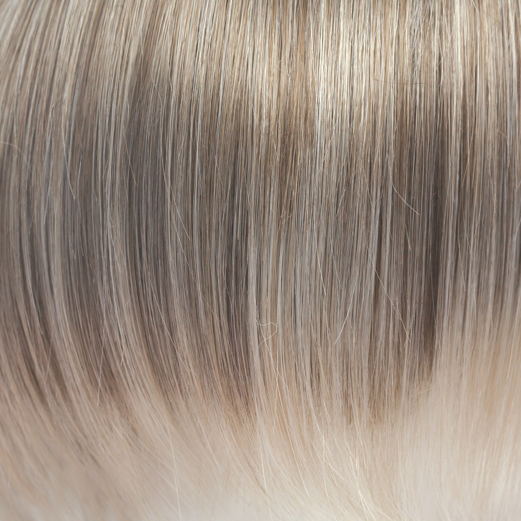 Ice Blond  -  This captivating clever color has a blend of beautiful ash blond highlights and velvet blonds. Towards the ends of the hair you are hit with blocks of ice blonde tips. This Ice Blond color combination is great in any style. It is crisp and coolâ€¦ we love it!