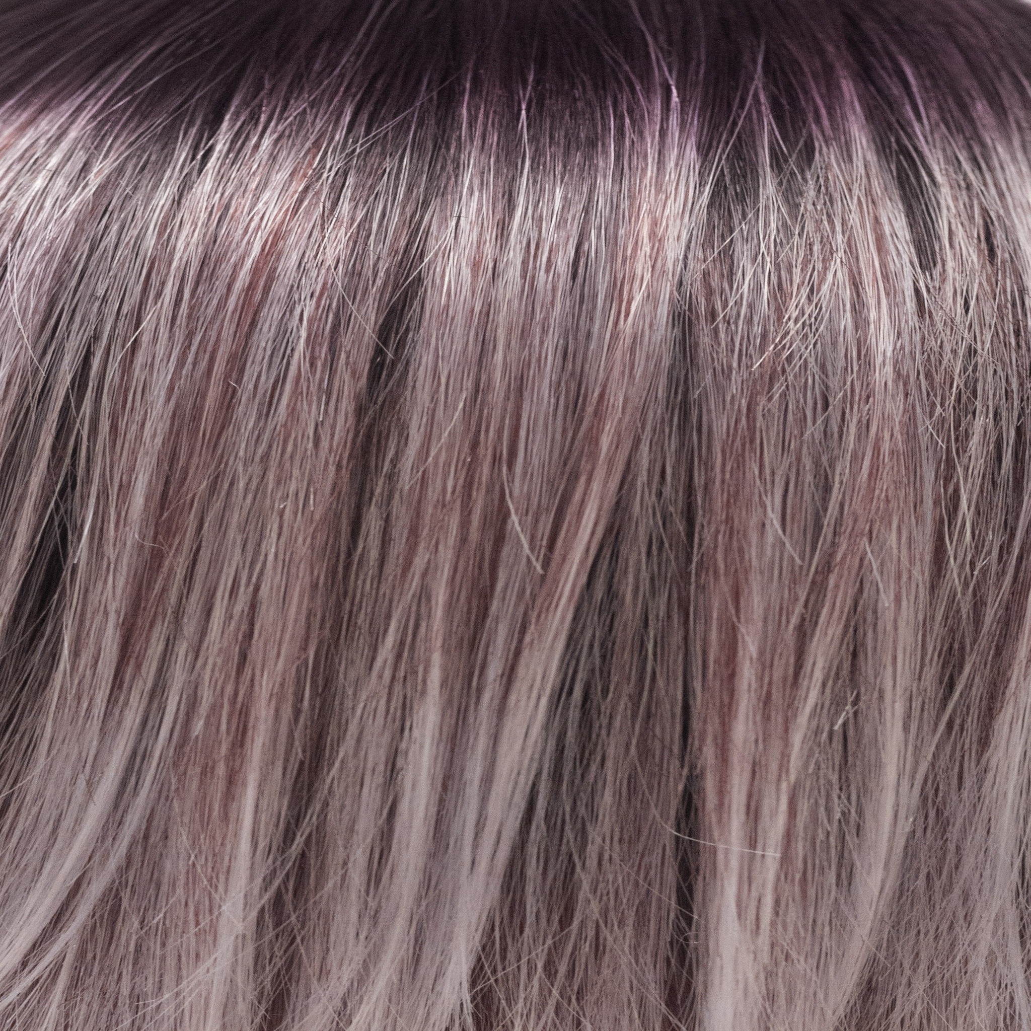Melted Plum  -  A very intelligent color! It has dark amethyst stretch roots that blend into medium vibrant violets and finish to pale lavender blond ends. This suits allâ€¦â€¦. super, vivid and chic!