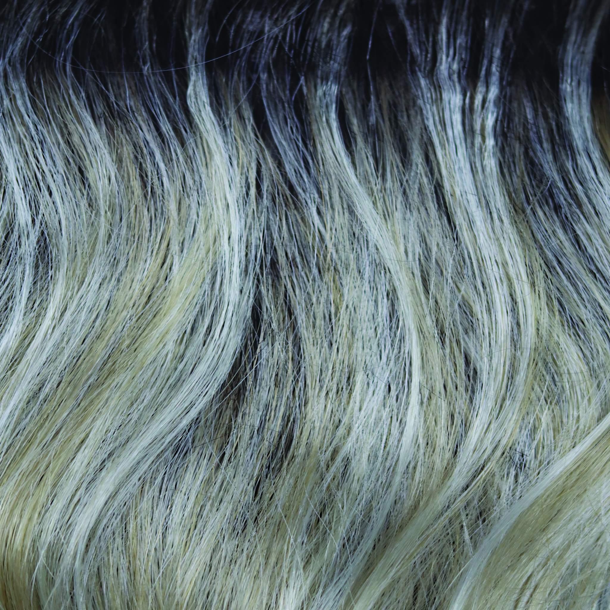 Shadowed Custard  -  This medium toffee rooted blond is packed full of weaves of custard cream slices and caramel undertones. 