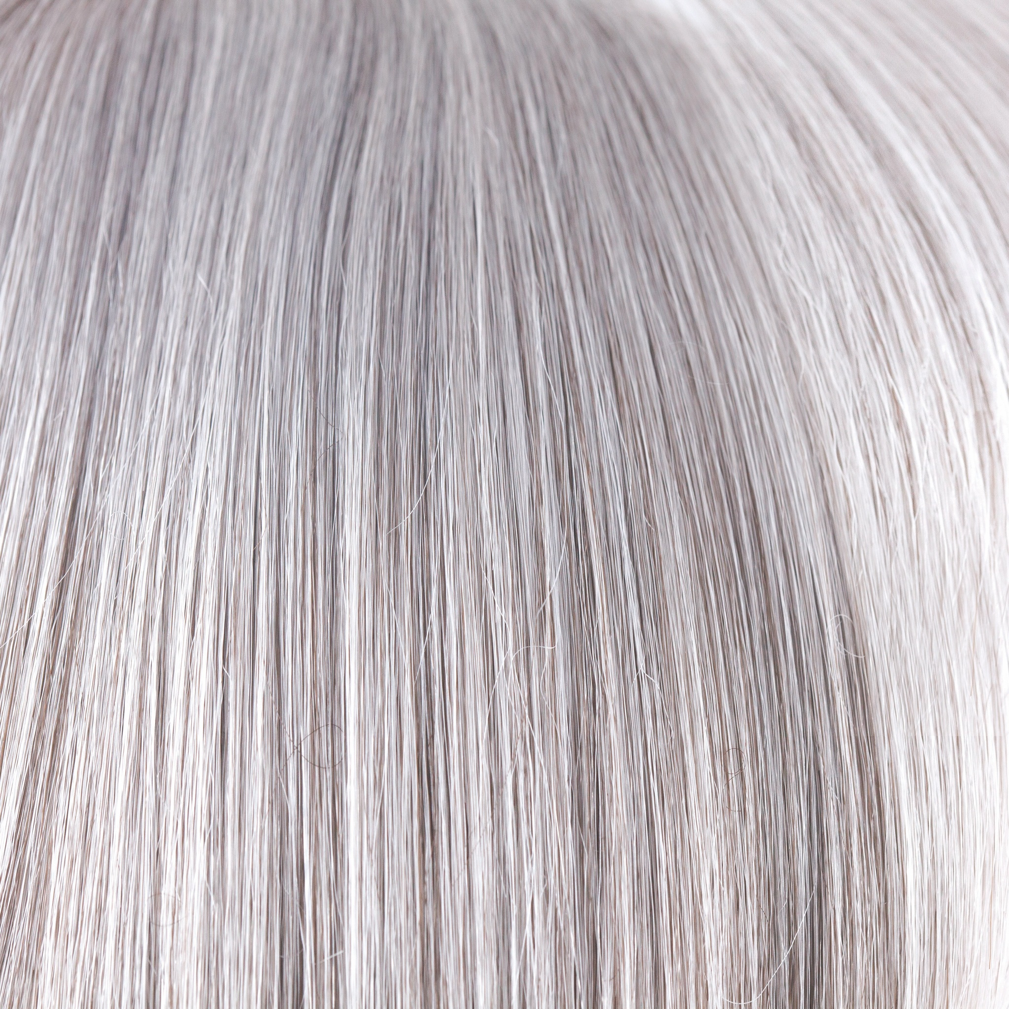 Silver Stone-R  -  A rooted version of our color Silver Stone. This color features a white silver tone front, silver and soft brown colors in middle, and dark brown mixed with silver nape.