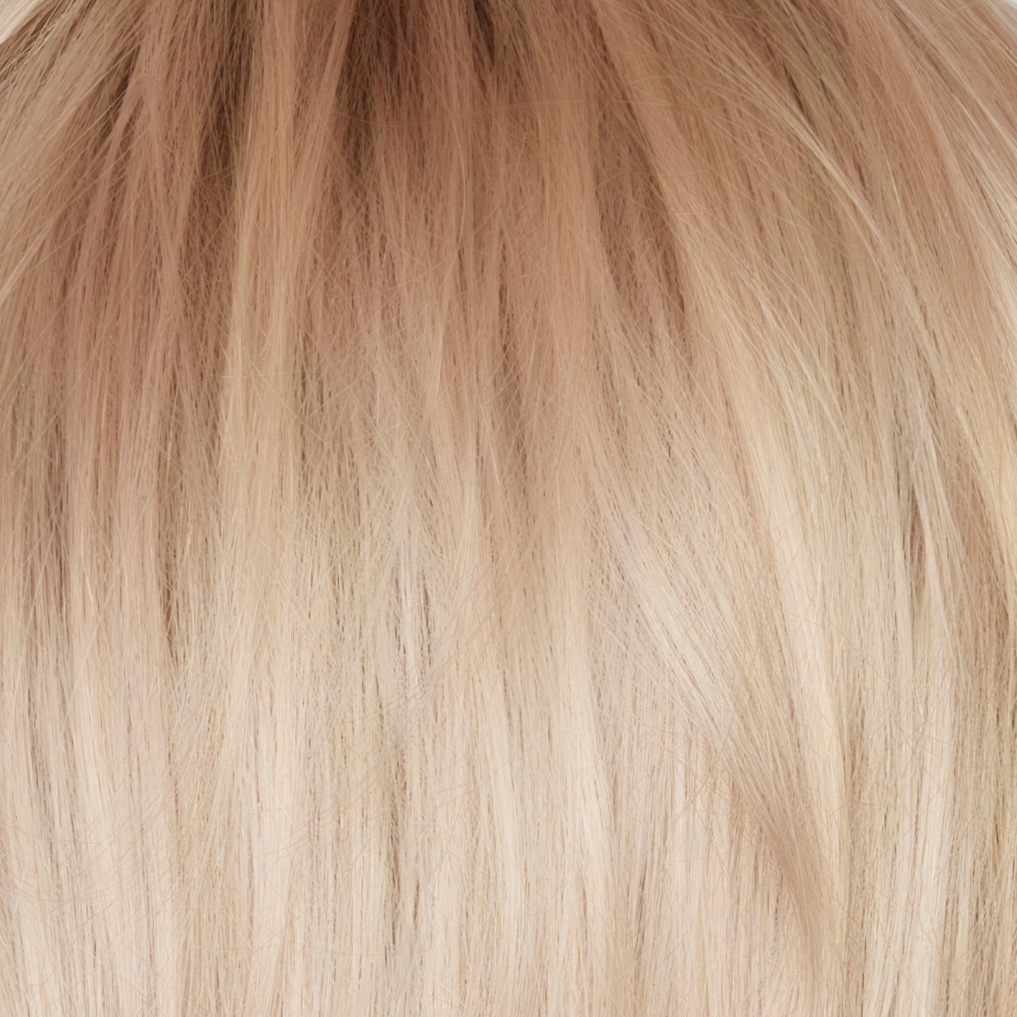 Snowy Peach-R - A beautiful and unique hair color that combines pale peach and platinum blond tones this color has a medium neutral blond rootÂ  regrowth.